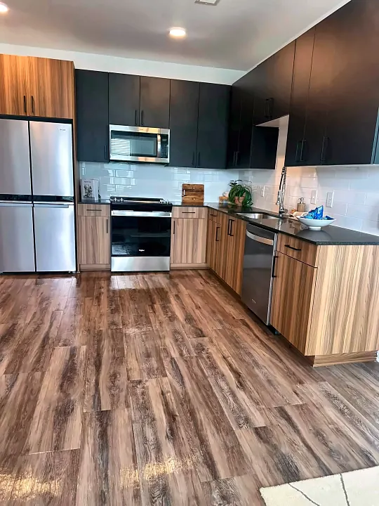 Kitchen with stainless appliances and clean counters